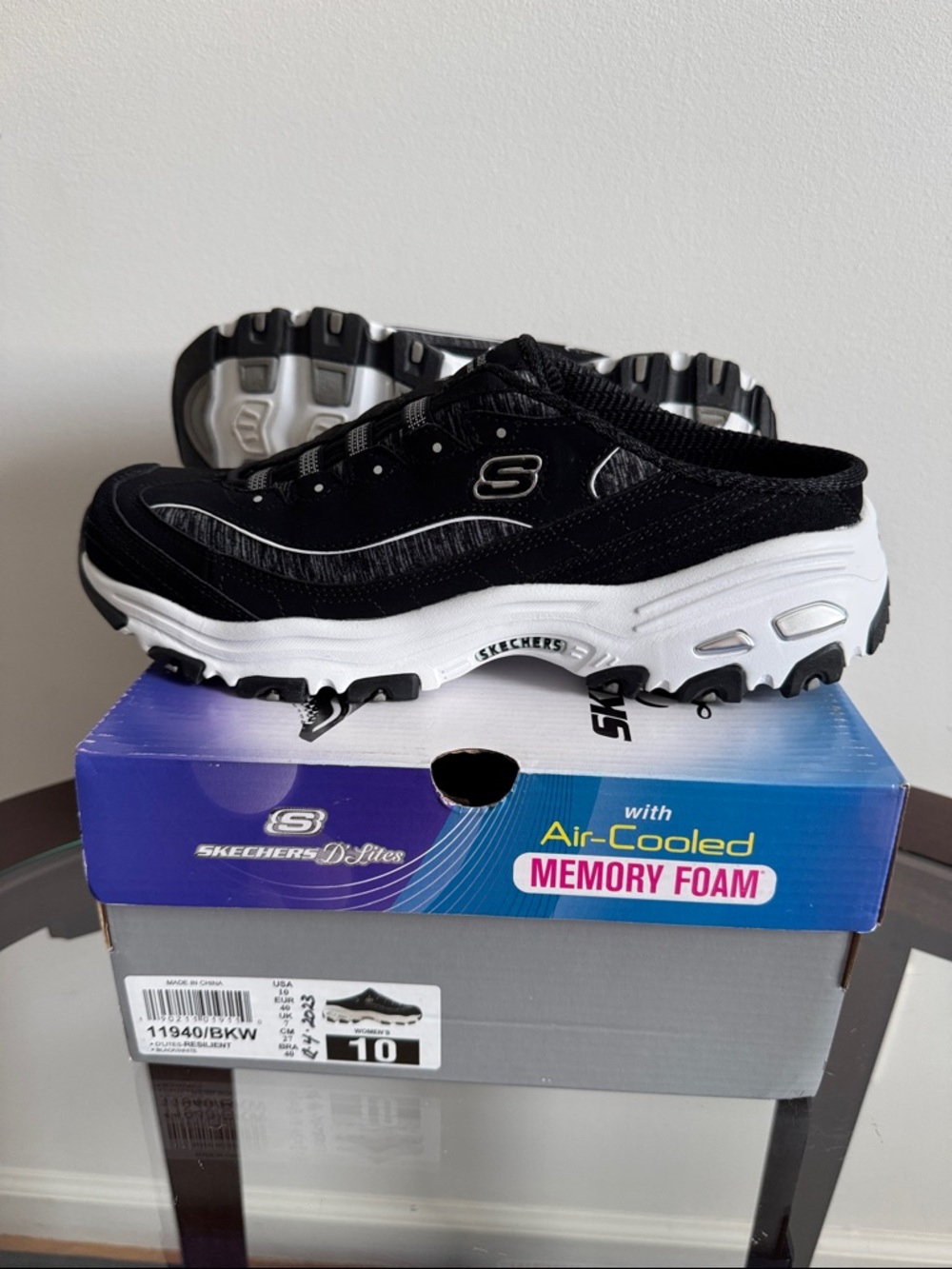 Skechers D’Lites Black & White Slip-On Sneakers